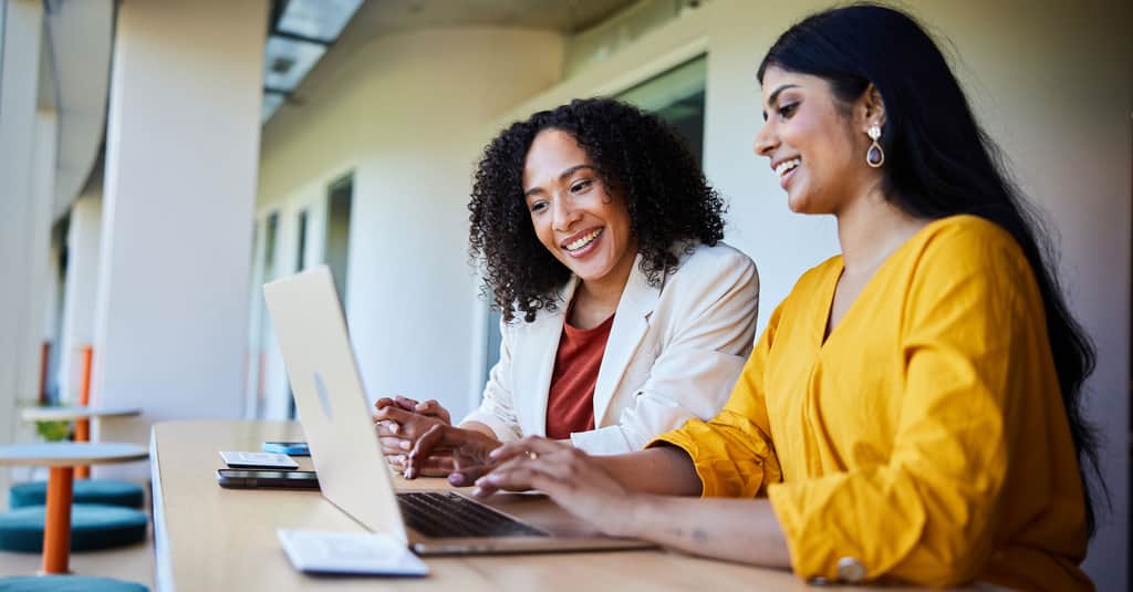 women with laptop large promo 2560 x 1338